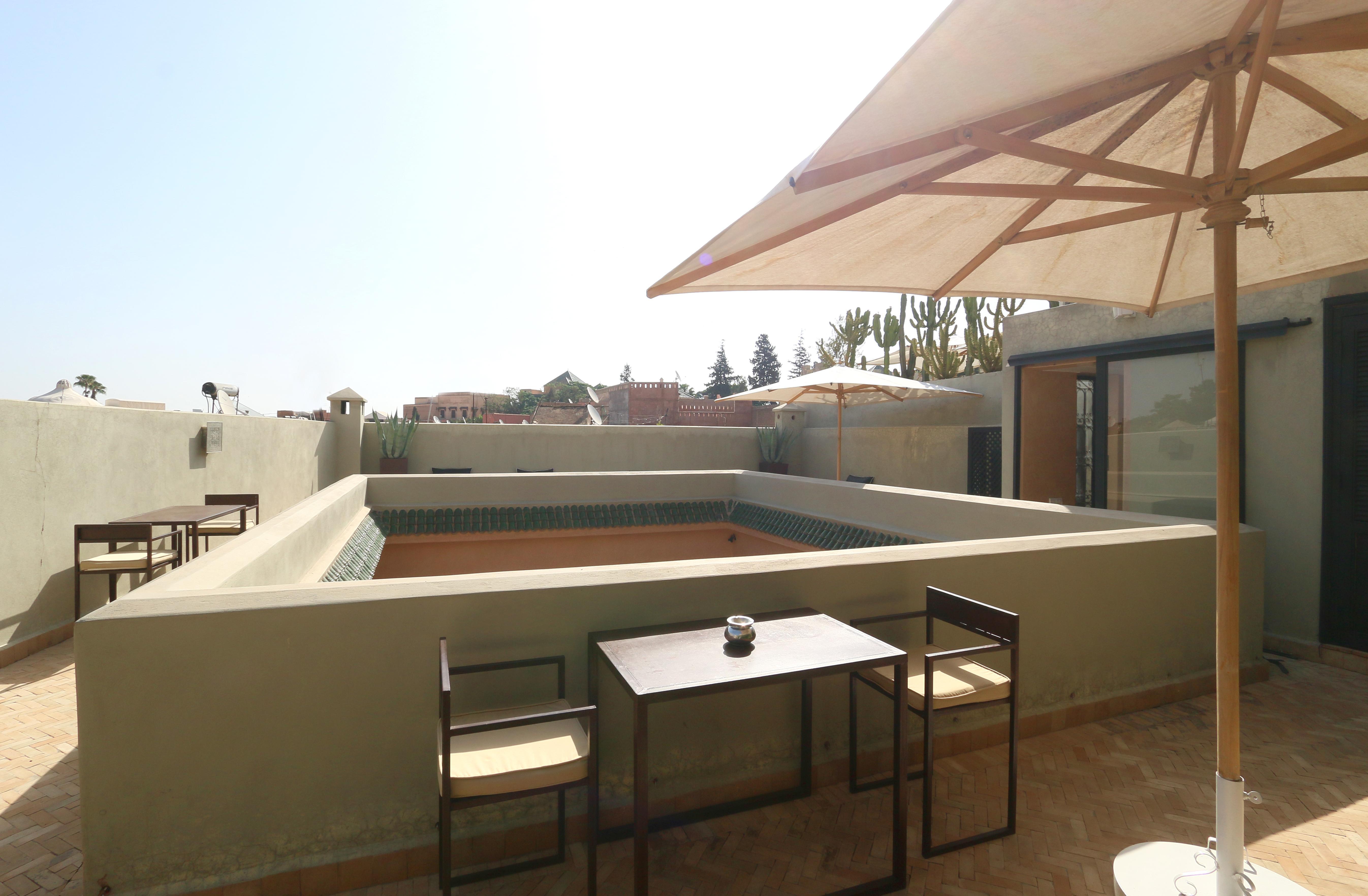 Ambre Epices Medina Riad Marrakesch Exterior foto Rooftop terrace